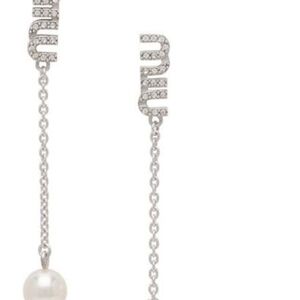 Mui Mui Pair of drop earrings in sterling silver. Swarovski.